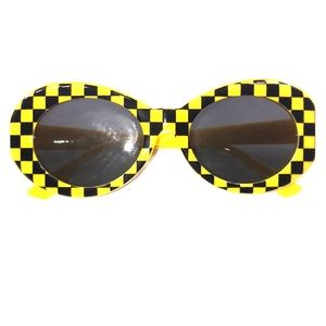 yellow, black checkered “clout goggles”